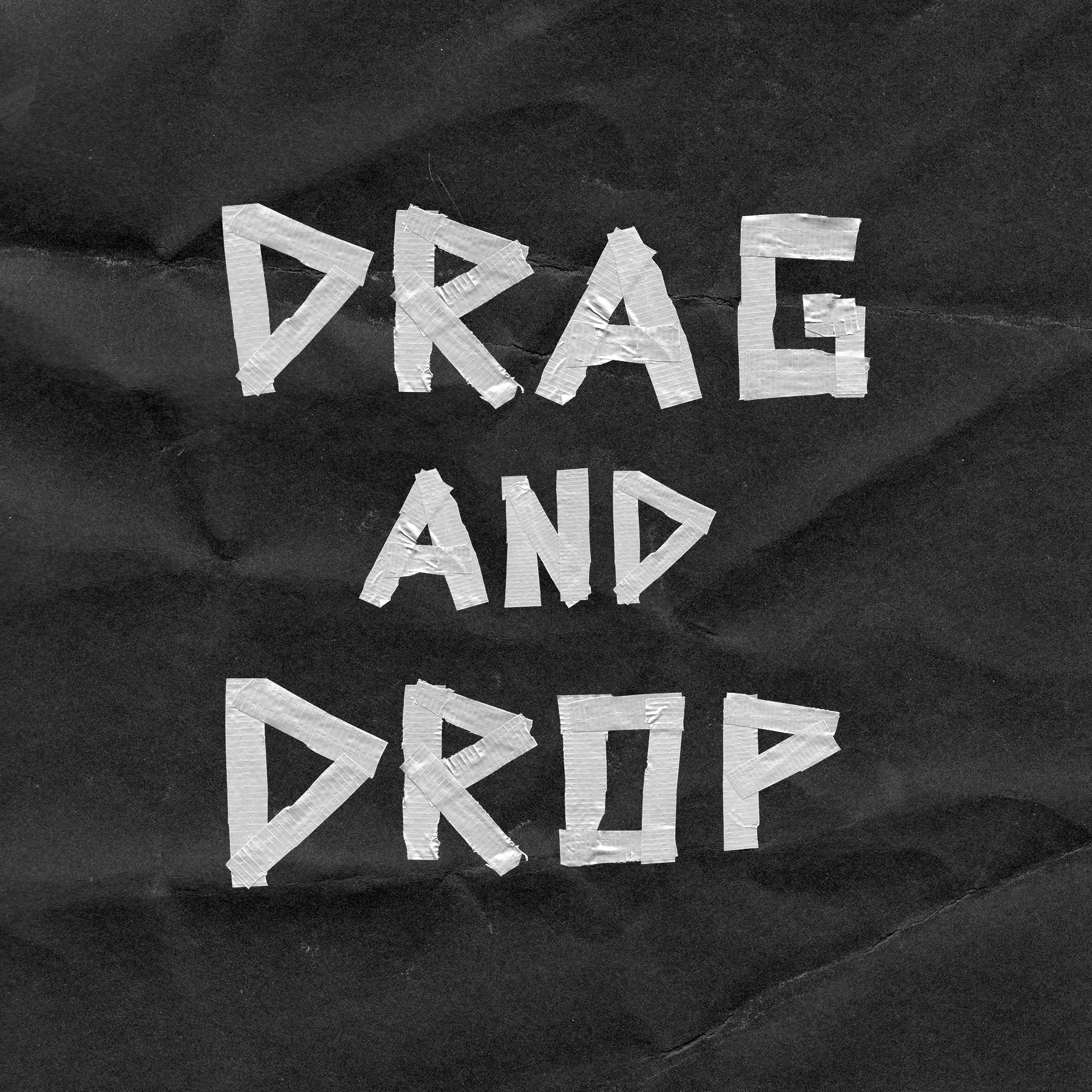 Text made out of duct tape on a textured background that reads "DRAG AND DROP".